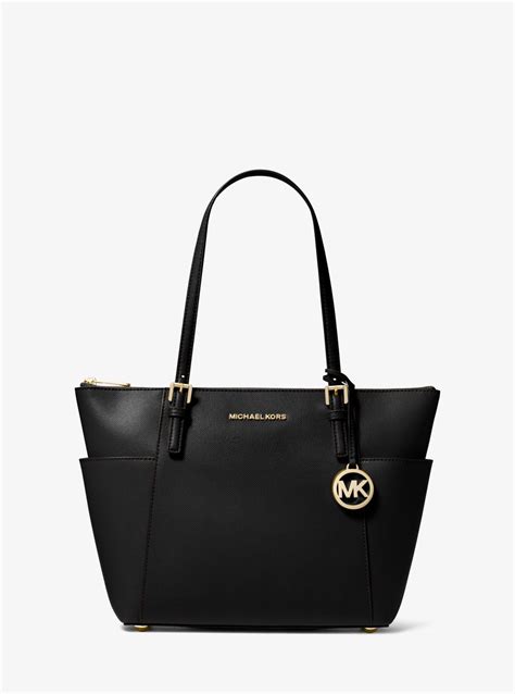 michael kors jet set item black zip top tote bag|Michael Kors airplane print bag.